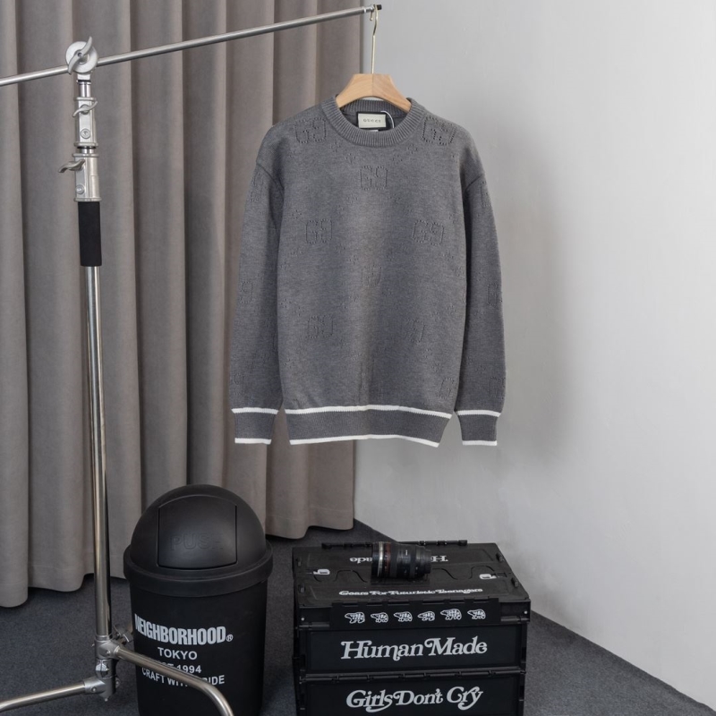 G*u*i sweaters